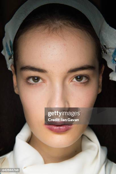 Model backstage ahead of the Theo VII show during the London Fashion Week February 2017 collections on February 19, 2017 in London, England.