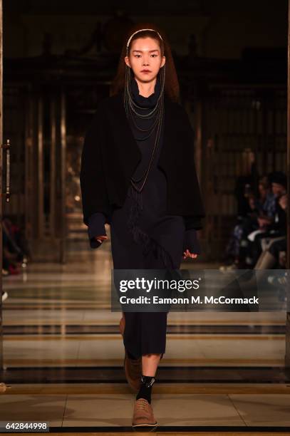 Model walks the runway at the Theo VII show during the London Fashion Week February 2017 collections on February 19, 2017 in London, England.