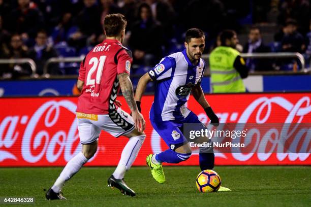 Florin Andone forward of Deportivo de La Coruña battles for the ball with Kiko Femenia defender of Deportivo Alaves during the La Liga Santander...