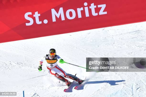 Austria's Marcel Hirscher competes in the second run of the men's slalom race at the 2017 FIS Alpine World Ski Championships in St Moritz on February...