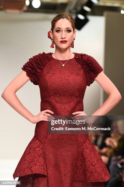 Model walks the runway at the Rohmir show during the London Fashion Week February 2017 collections on February 19, 2017 in London, England.