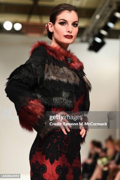 Model walks the runway at the Rohmir show during the London Fashion Week February 2017 collections on February 19, 2017 in London, England.