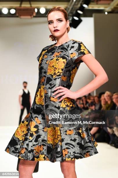 Model walks the runway at the Rohmir show during the London Fashion Week February 2017 collections on February 19, 2017 in London, England.