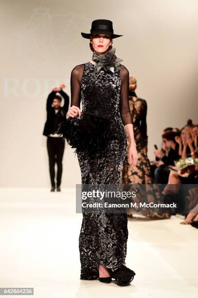 Model walks the runway at the Rohmir show during the London Fashion Week February 2017 collections on February 19, 2017 in London, England.