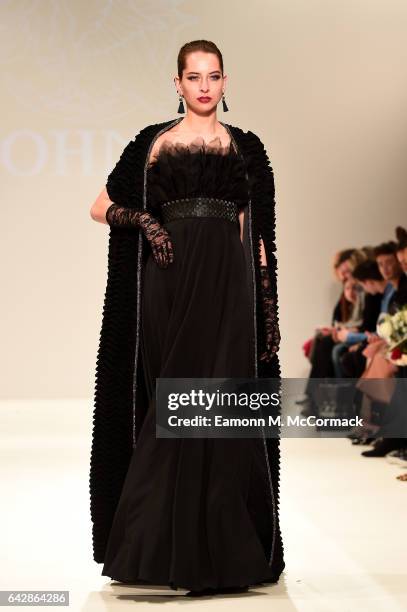 Model walks the runway at the Rohmir show during the London Fashion Week February 2017 collections on February 19, 2017 in London, England.