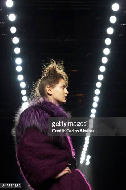 Model walks the runway at the Ulises Merida show during the Mercedes-Benz Madrid Fashion Week Autumn/Winter 2017/2018 on February 19, 2017 in Madrid,...