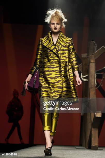 Model walks the runway at the Ulises Merida show during the Mercedes-Benz Madrid Fashion Week Autumn/Winter 2017/2018 on February 19, 2017 in Madrid,...
