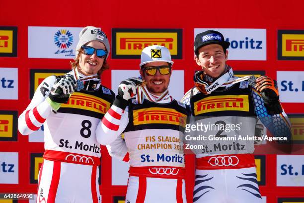 Manuel Feller of Austria wins the silver medal, Marcel Hirscher of Austria wins the gold medal, Felix Neureuther of Germany wins the bronze medal...