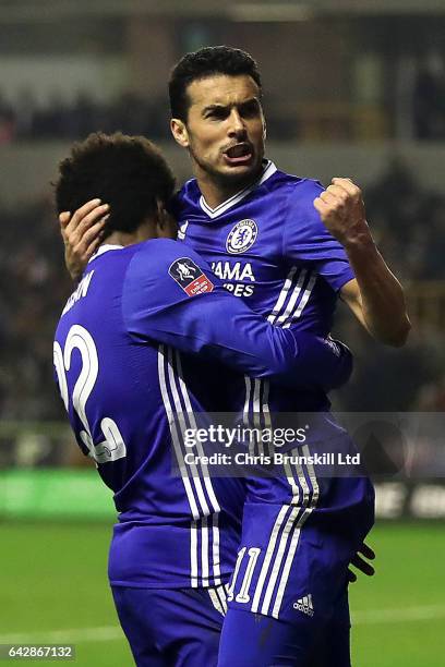 Pedro of Chelsea celebrates scoring the opening goal with team-mate Willian during the Emirates FA Cup Fifth Round match between Wolverhampton...