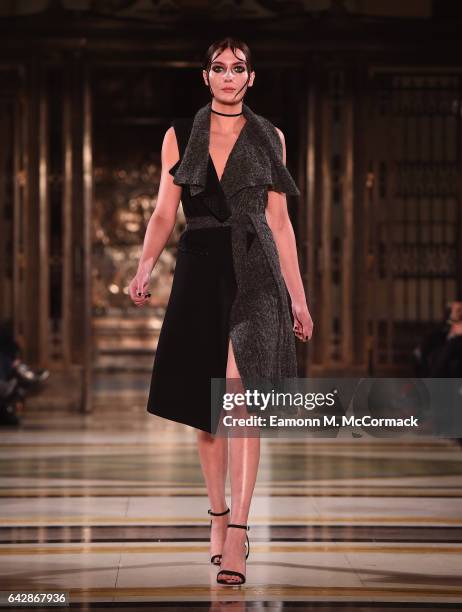 Model walks the runway at the Annderstand show during the London Fashion Week February 2017 collections on February 19, 2017 in London, England.
