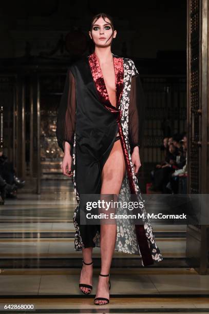 Model walks the runway at the Annderstand show during the London Fashion Week February 2017 collections on February 19, 2017 in London, England.