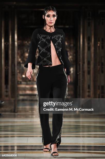 Model walks the runway at the Annderstand show during the London Fashion Week February 2017 collections on February 19, 2017 in London, England.