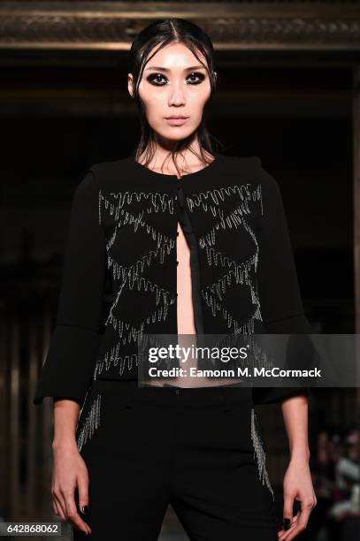 Model walks the runway at the Annderstand show during the London Fashion Week February 2017 collections on February 19, 2017 in London, England.