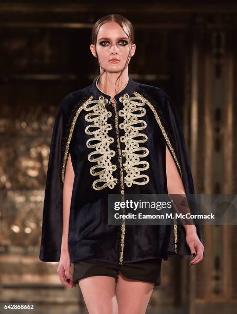 Model walks the runway at the Annderstand show during the London Fashion Week February 2017 collections on February 19, 2017 in London, England.