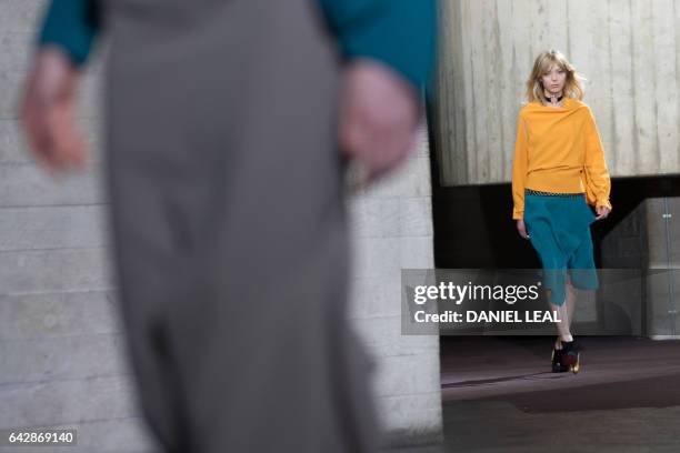 Models present creations during the catwalk show of France's Roland Mouret on the third day of the Autumn/Winter 2017 London Fashion Week at the...