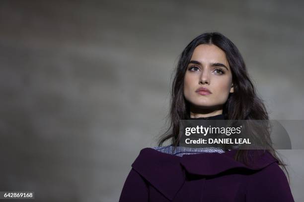 Models present creations during the catwalk show of France's Roland Mouret on the third day of the Autumn/Winter 2017 London Fashion Week at the...