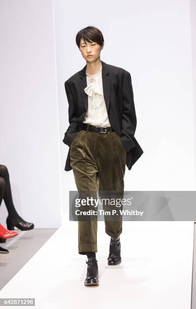 Model walks the runway at the Margaret Howell show during the London Fashion Week February 2017 collections at Rambert on February 19, 2017 in...