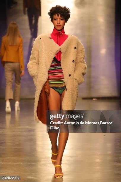 Model Dilone walks the runway at the Topshop Unique show during the London Fashion Week February 2017 collections on February 19, 2017 in London,...