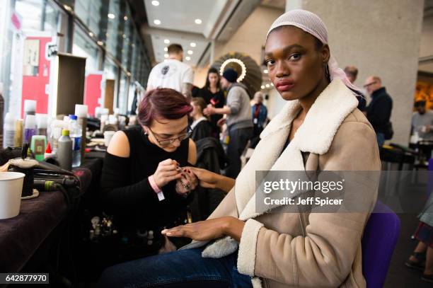 Model backstage ahead of the Preen by Thornton Bregazzi show during the London Fashion Week February 2017 collections on February 19, 2017 in London,...