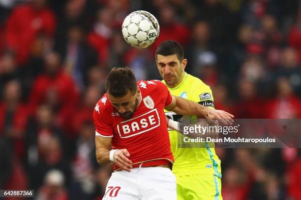 Orlando Sa of Standard Liege battles for the ball with Stefan Mitrovic of K.A.A. Gent during the Belgian Jupiler Pro League match between Royal...