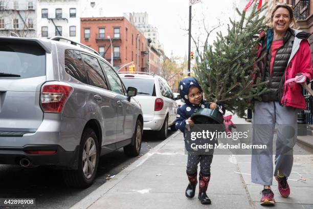 young girl and her mom in new york city - polka dot rain boots women stock pictures, royalty-free photos & images