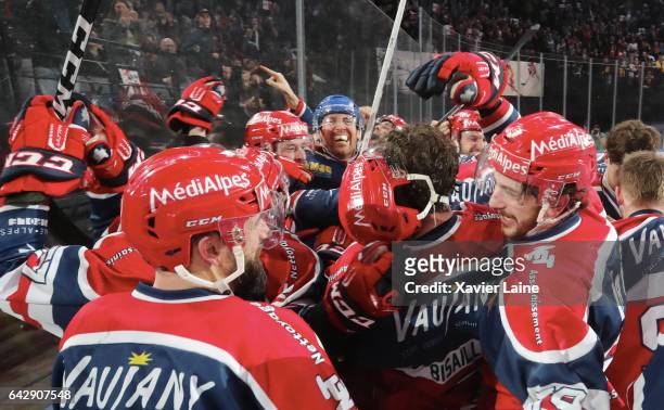 Captain Eric Chouinard of Grenoble celebrate his goal of the victory with teammates during the French Cup finale Hockey match between Dragons de...