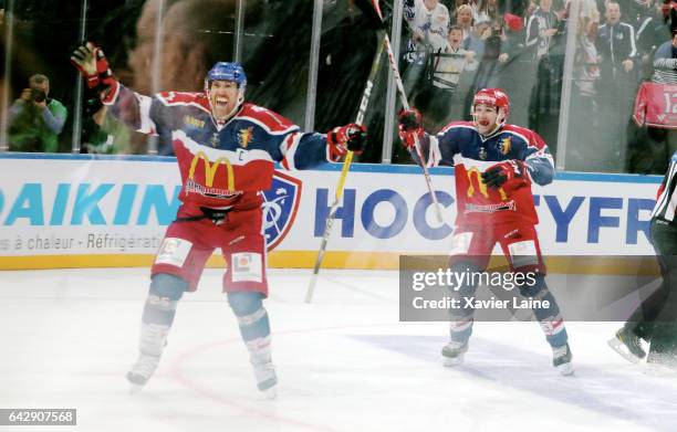 Captain Eric Chouinard of Grenoble celebrate his goal of the victory with teammates during the French Cup finale Hockey match between Dragons de...