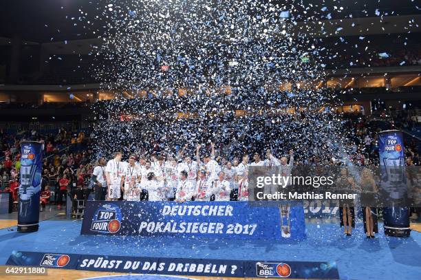 Brose Bamberg players celebrate during the award ceremony after the game between Bayern Muenchen and Brose Bamberg on february 19, 2017 in Berlin,...