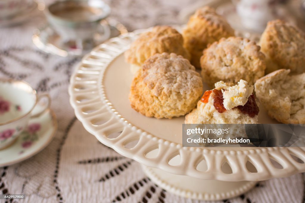 Close-up of English scones with clottted cream and jam
