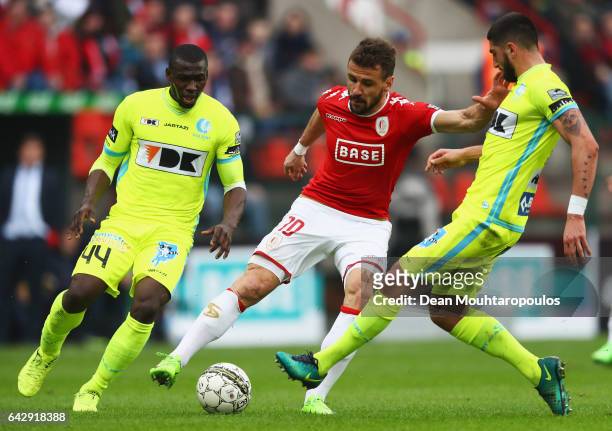 Orlando Sa of Standard Liege battles for the ball with Samuel Gigot and Anderson Esiti of K.A.A. Gent during the Belgian Jupiler Pro League match...