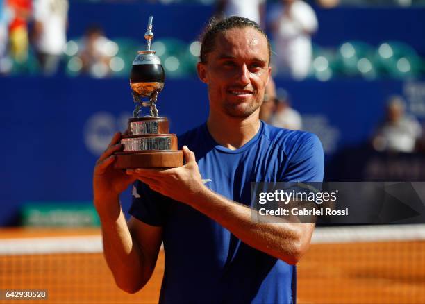 Alexandr Dolgopolov of Ukraine poses with the trophy after wining the final match between Kei Nishikori of Japan and Alexandr Dolgopolov of Ukraine...