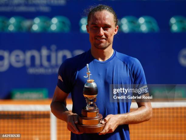 Alexandr Dolgopolov of Ukraine poses with the trophy after wining the final match between Kei Nishikori of Japan and Alexandr Dolgopolov of Ukraine...