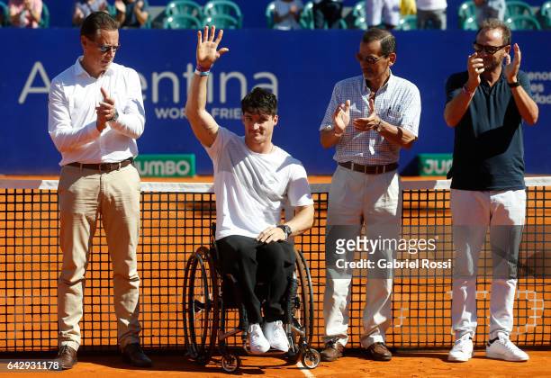 Wheelchair tennis player and former Paralympic flag bearer of Argentina Gustavo Fernandez salutes during the award ceremony after a final match...