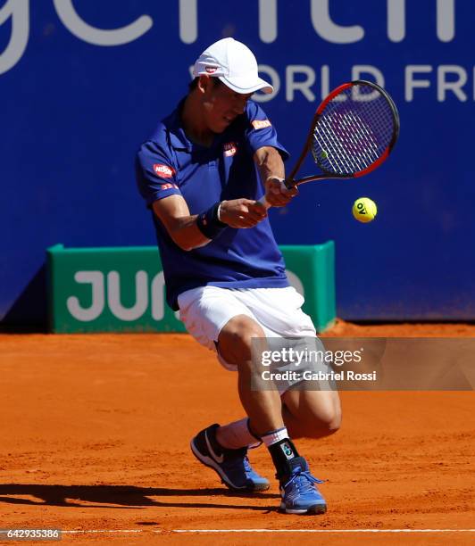 Kei Nishikori of Japan takes a backhand shot during a final match between Kei Nishikori of Japan and Alexandr Dolgopolov of Ukraine as part of ATP...