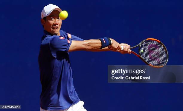 Kei Nishikori of Japan takes a backhand shot during a final match between Kei Nishikori of Japan and Alexandr Dolgopolov of Ukraine as part of ATP...