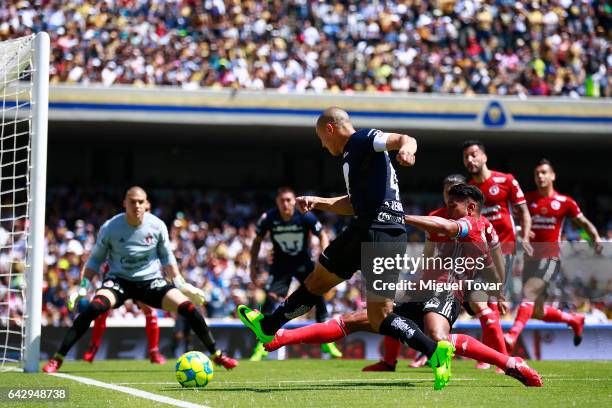 Dario Veron of Pumas kicks the ball during the 7th round match between Pumas UNAM and Tijuana as part of the Torneo Clausura 2017 Liga MX at Olimpico...