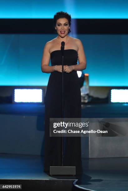 Presenter Alyssa Milano speaks onstage during the NHL 100 presented by GEICO show as part of the 2017 NHL All-Star Weekend at the Microsoft Theater...