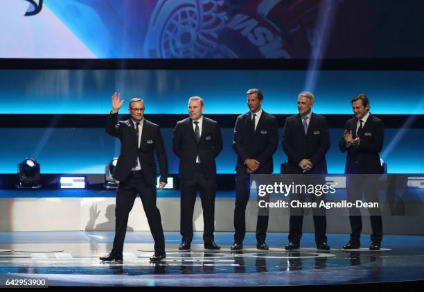 Top 100 players Steve Yzerman, Adam Oates, Mike Modano, Ron Francis and Sergei Fedorov stand onstage during the NHL 100 presented by GEICO show as...