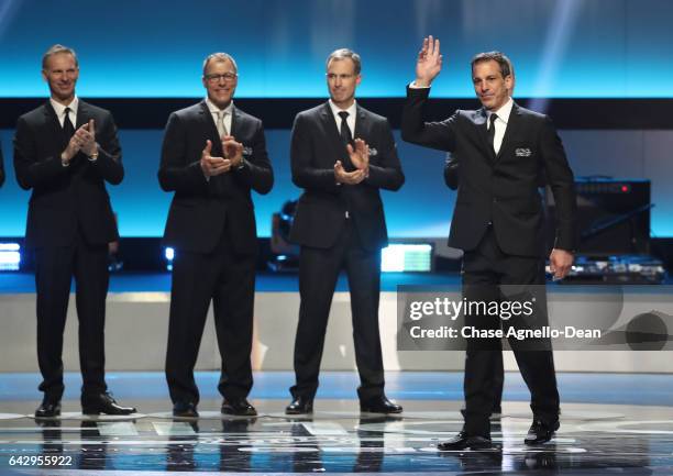 Top 100 player Chris Chelios, right, waves to the audience during the NHL 100 presented by GEICO show as part of the 2017 NHL All-Star Weekend at the...