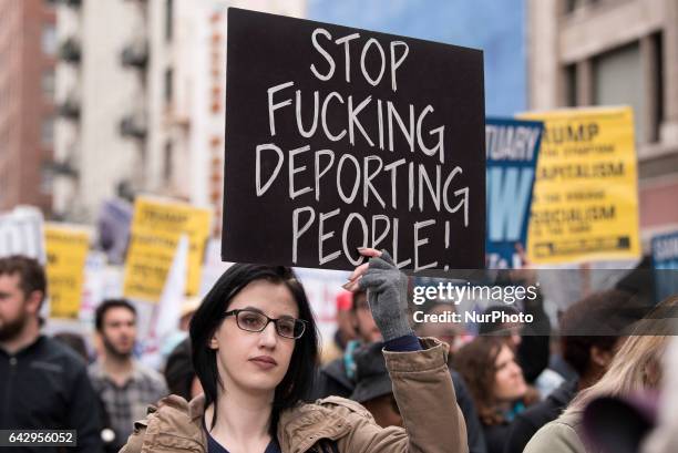 Protesters at a pro-immigration rally where organizers called for a stop to the Immigration and Customs Enforcement raids and deportations of illegal...