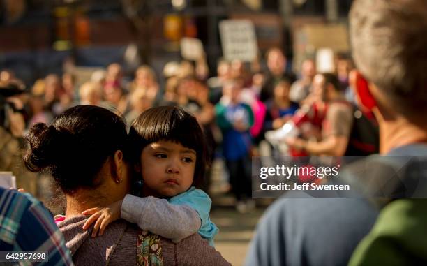 Roughly 100 anti-Trump protesters demonstrate peacefully in Market Square on February 19, 2017 in Pittsburgh, Pennsylvania. The protesters voiced...