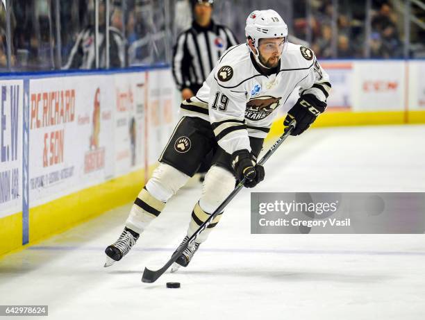 Riley Barber of the Hershey Bears brings the puck up ice during a game against the Bridgeport Sound Tigers at the Webster Bank Arena on February 19,...