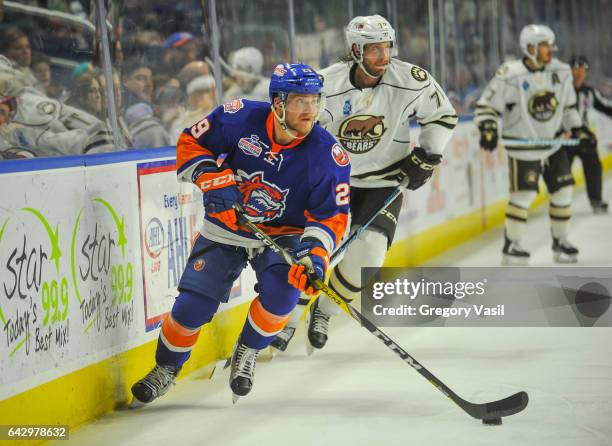 Connor Jones of the Bridgeport Sound Tigers brings the puck up ice during a game against the Hershey Bears at the Webster Bank Arena on February 19,...