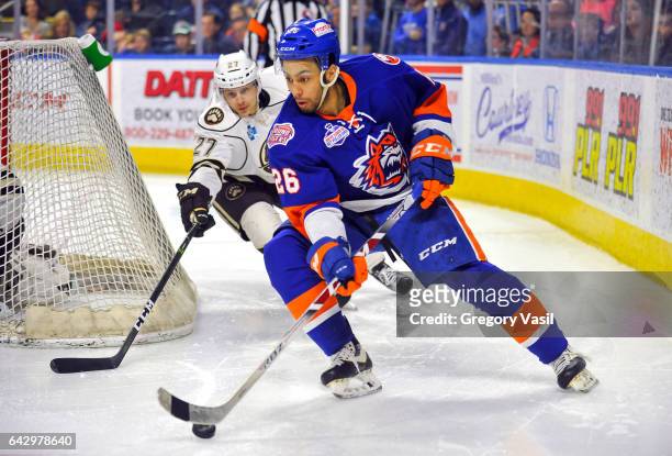 Josh Ho-Sang of the Bridgeport Sound Tigers brings the puck around the goal during a game against the Hershey Bears at the Webster Bank Arena on...