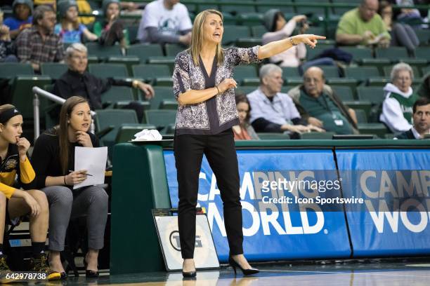 Northern Kentucky Norse head coach Camryn Whitaker shouts instructions during the first quarter of the women's college basketball game between the...