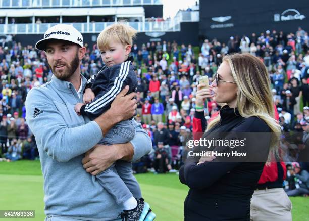 Dustin Johnson celebrates his win with wife Paulina Gretzky and son Tatum on the 18th green during the final round at the Genesis Open at Riviera...