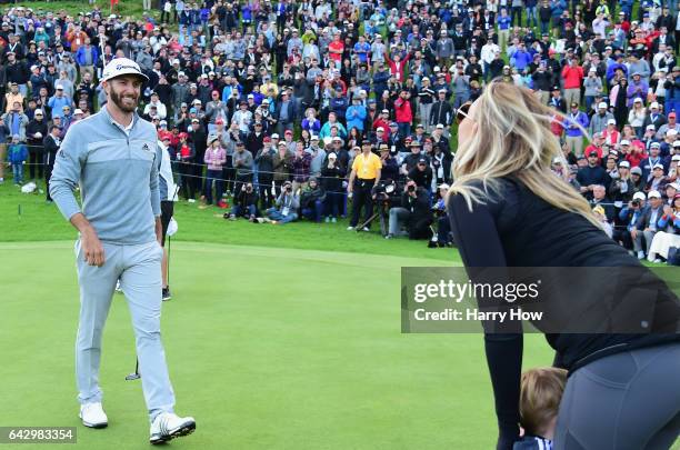 Dustin Johnson celebrates his win with wife Paulina Gretzky and son Tatum on the 18th green during the final round at the Genesis Open at Riviera...