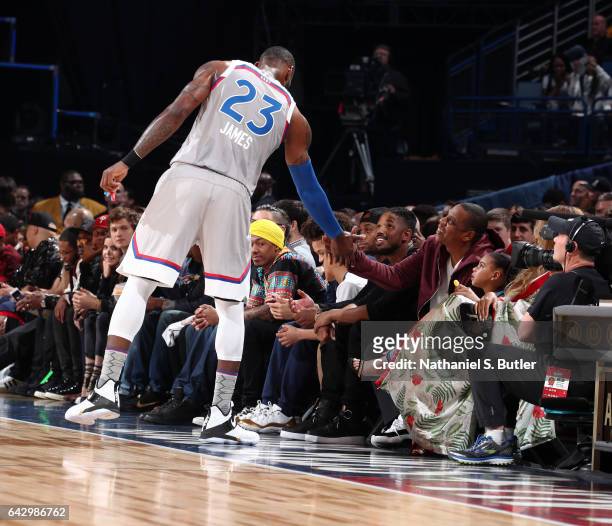 LeBron James of the Eastern Conference All-Stars greets Jay-Z during the NBA All-Star Game as part of the 2017 NBA All Star Weekend on February 19,...