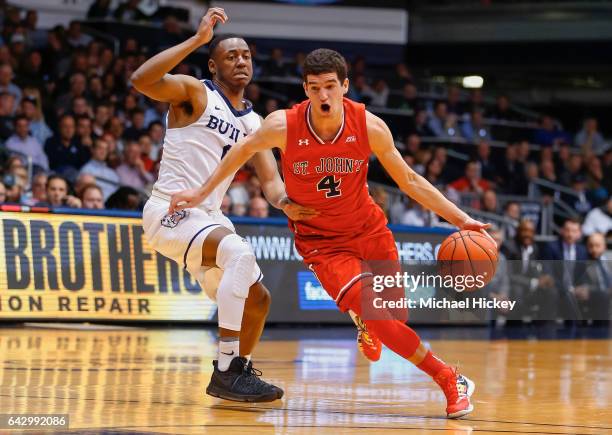 Federico Mussini of the St. John's Red Storm drives to the basket against Avery Woodson of the Butler Bulldogs at Hinkle Fieldhouse on February 15,...