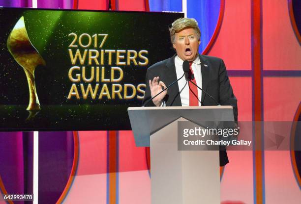 Donald Trump impersonator speaks onstage during the 2017 Writers Guild Awards L.A. Ceremony at The Beverly Hilton Hotel on February 19, 2017 in...